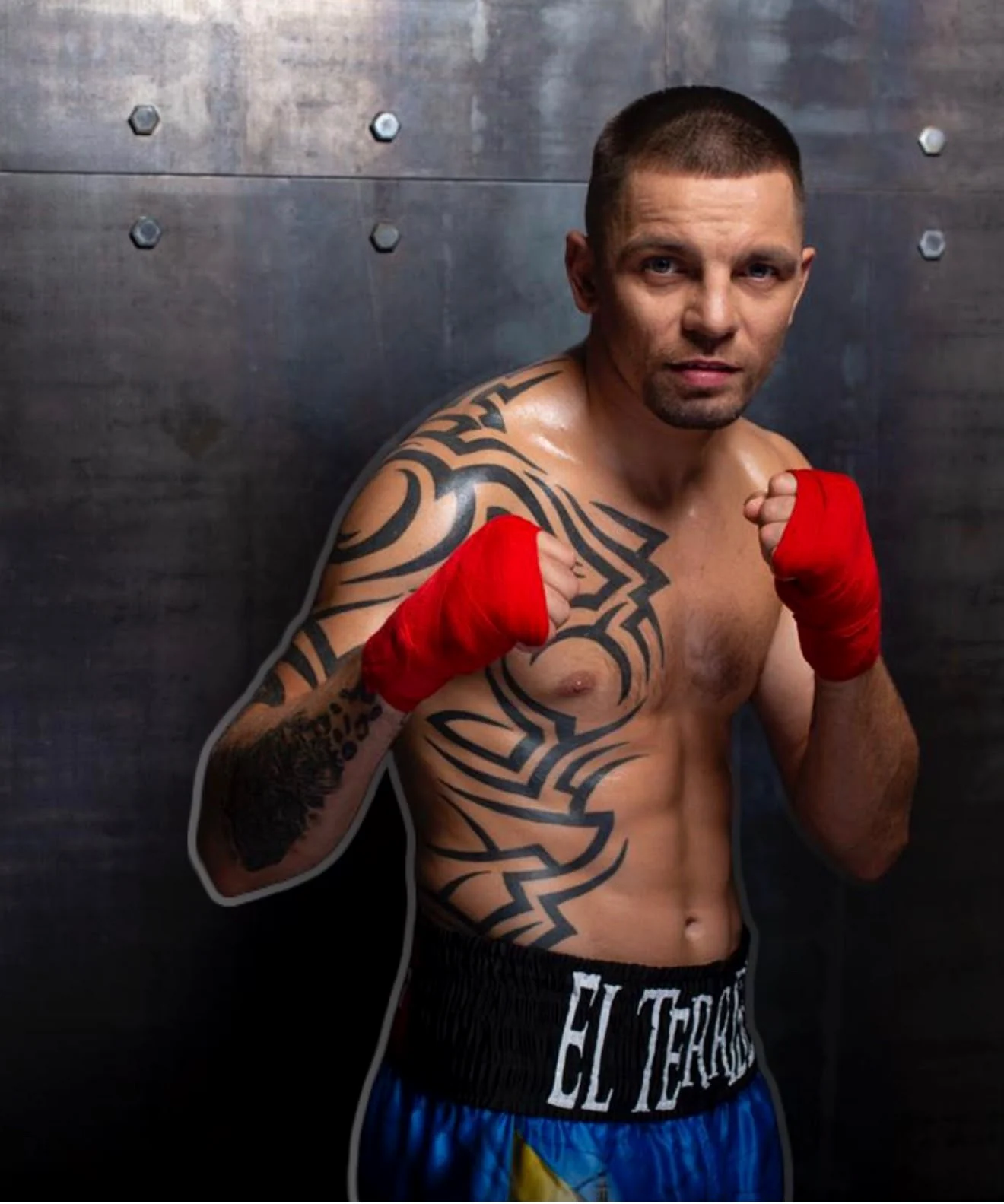 Ivan Redkach in a boxing stance in a cinematic studio portrait